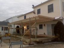 Before a completed custom deck builder project in the Ocean City, NJ area